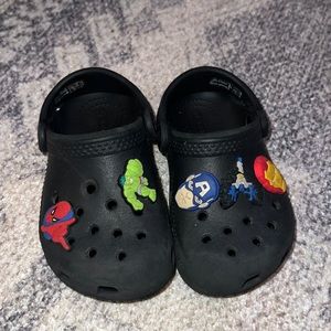 Plain black toddler crocs with superhero giblets